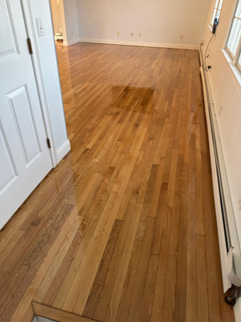 Beige wood-colored hardwood installation on the second floor